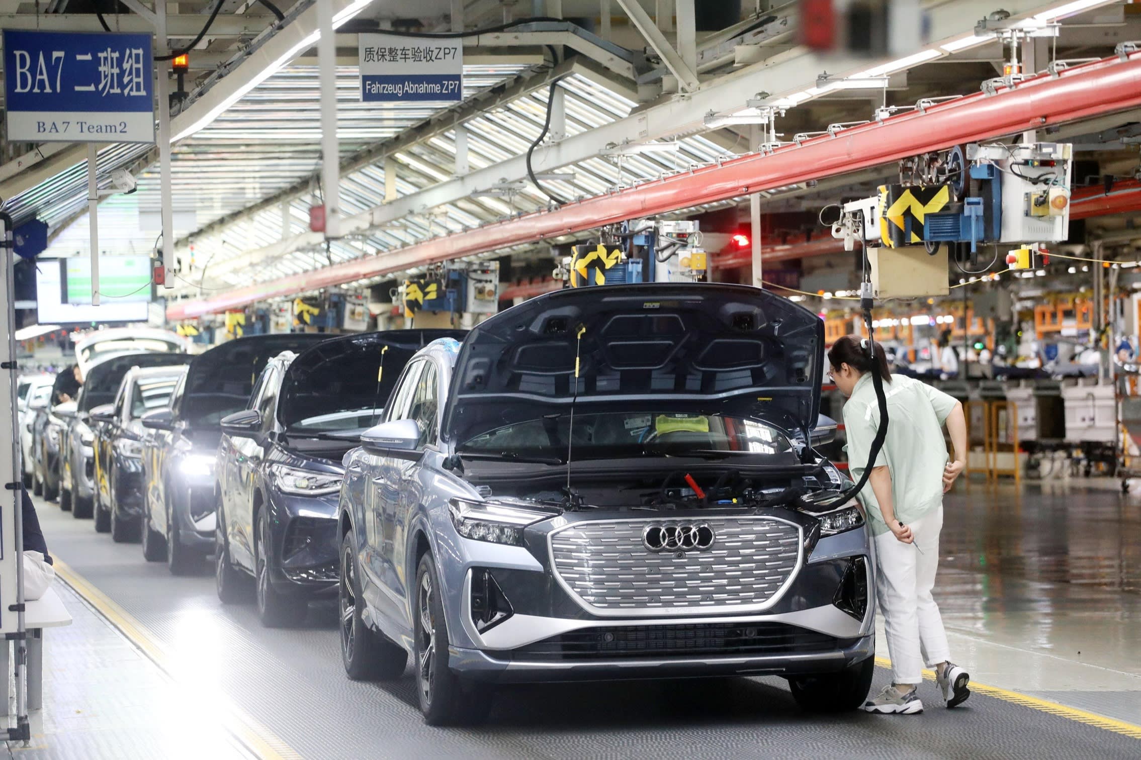 EU moves against China’s electric- car makers in bid to shield own industry 2 An FAW-Volkswagen production line in Foshan in Guangdong province, China