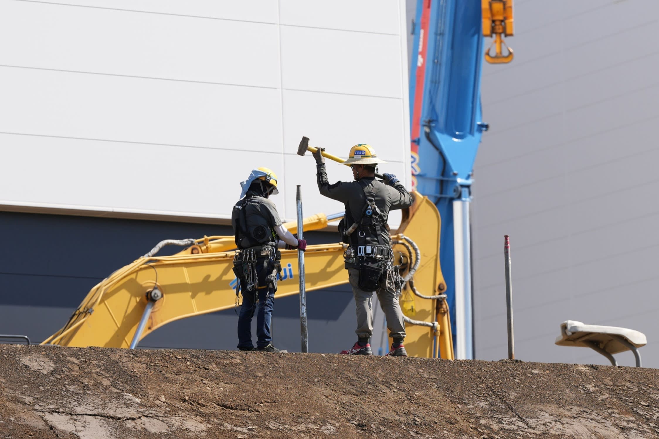 Workers at the construction site of TSMC’s factory in Kikuyo, Japan