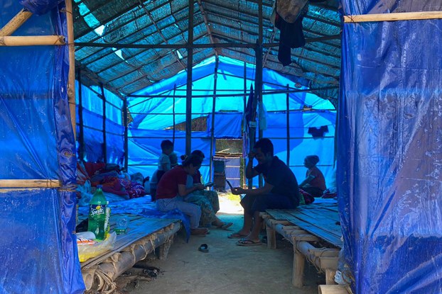 ENG_BUR_IndiaWall_09252023.2.jpg Refugees who fled Myanmar rest in a shelter at Farkawn quarantine camp in India's eastern state of Mizoram near the Myanmar border, Sept. 23, 2021. Credit: AFP