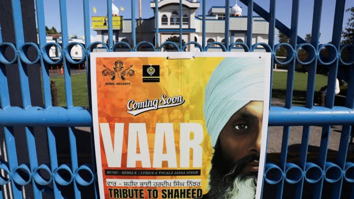 A sign outside the Guru Nanak Sikh Gurdwara temple is seen after the killing on its grounds in June 2023 of Sikh leader Hardeep Singh Nijjar, in Surrey,