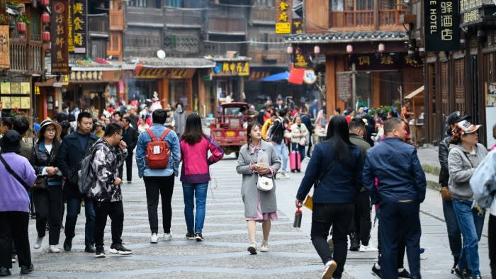 A picture of tourists visiting Dong village
