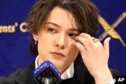 FILE -Kauan Okamoto, a musician and former member of Japanese pop group Johnny's Jr., speaks during a press conference at the Foreign Correspondents' Club of Japan, April 12, 2023, in Tokyo.