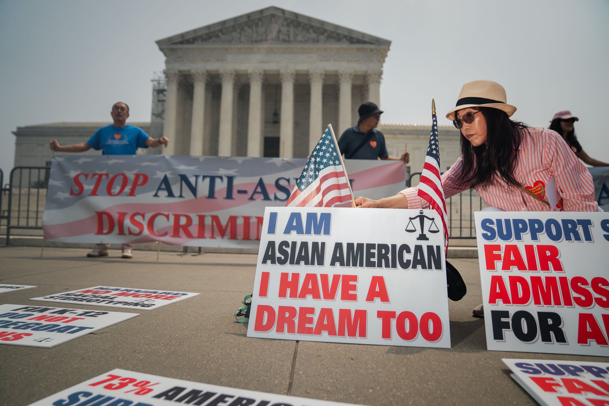People with the Asian American Coalition for Education rally outside the US Supreme Court building on June 29 as the court ruled on race-conscious admission programmes. Photo: Los Angeles Times/TNS survey of 30 years of chinese students in us reflects pressures as well as satisfaction 1