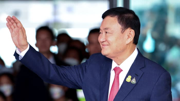 Former Thai prime minister Thaksin Shinawatra arrives at Don Mueang airport in Bangkok on Tuesday