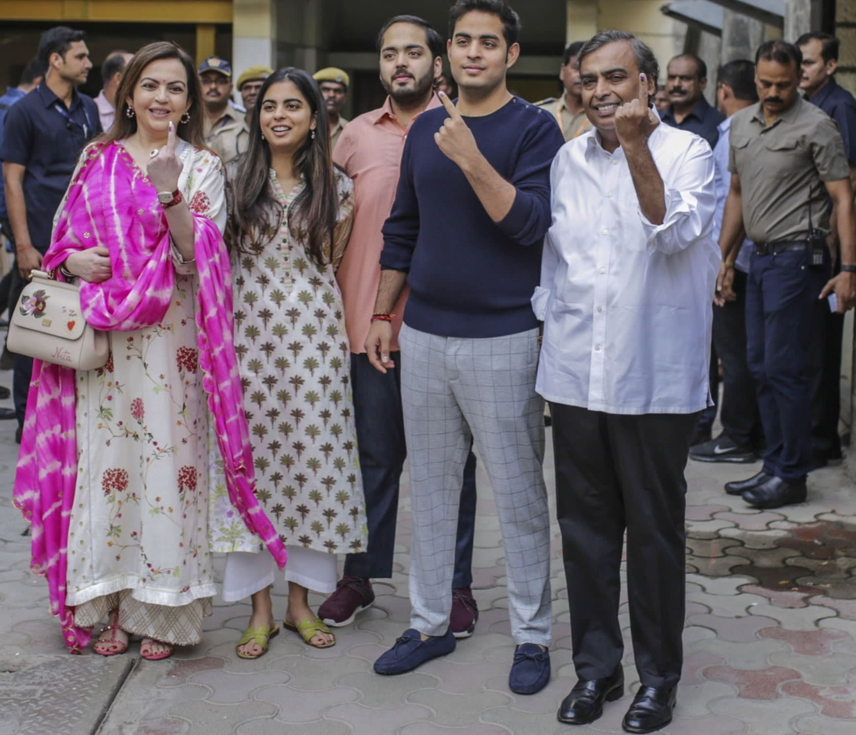 Mukesh Ambani, pictured with Akash, in the blue top, Anant, Isha, and his wife Nita
