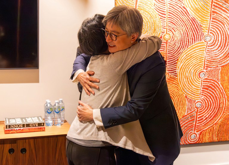 ENG_CHN_ChengLeiRelease_10112023.2.JPG Australian Foreign Minister Penny Wong hugs Australian journalist Cheng Lei on arrival at Melbourne Airport in Melbourne, Wednesday, Oct. 11, 2023. Credit: AAP Image/Supplied by the Department of Foreign Affairs and Trade via Reuters