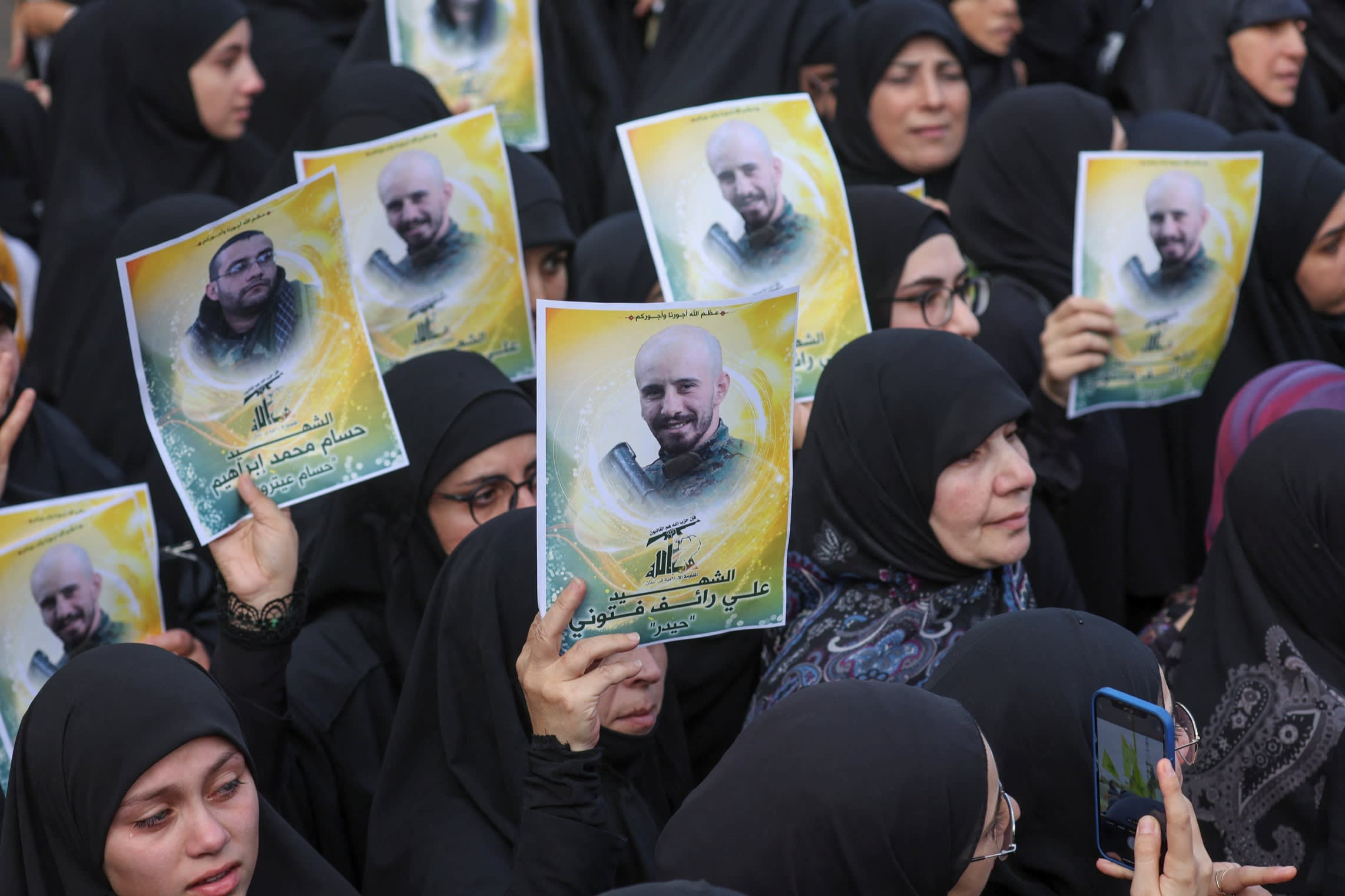 A funeral for Hezbollah members killed during Israeli shelling of southern Lebanon