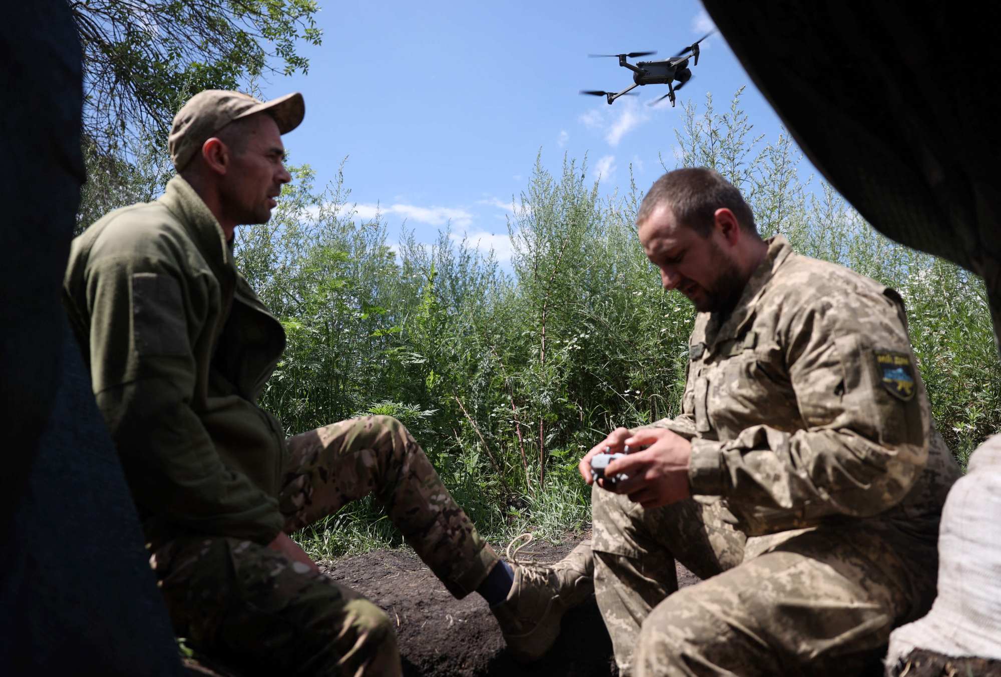 Ukrainian soldiers flying a drone at a frontline position in the Donetsk region. Photo: AFP