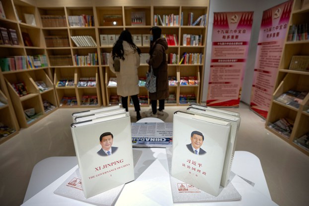 ENG_CHN_PatrioticEducation_10202023.4.jpg Copies of 'The Governance of China' by Chinese President Xi Jinping are displayed in a Beijing bookstore, Dec. 24, 2021. Credit: Mark Schiefelbein/AP