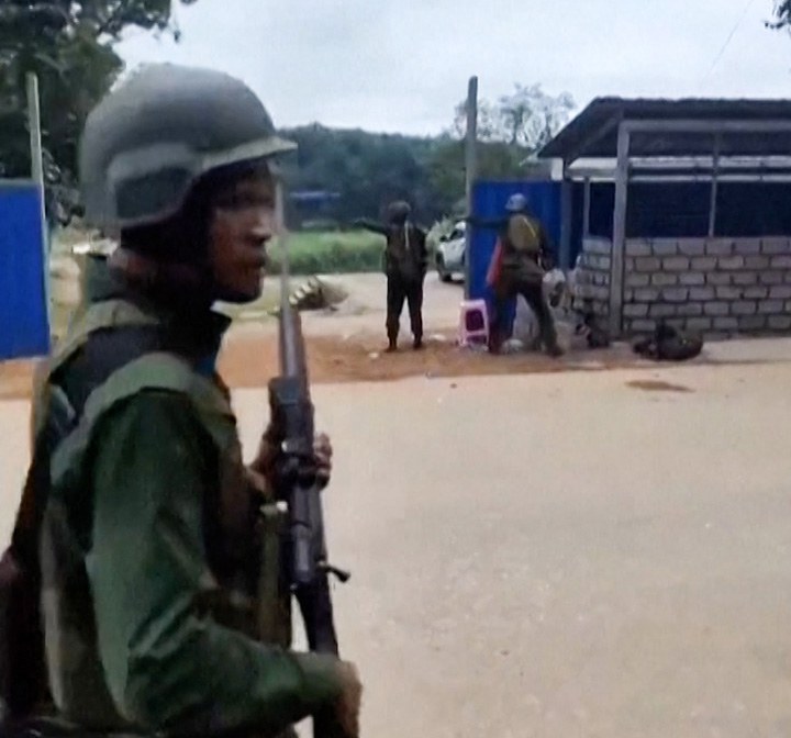 ENG_BUR_AllianceArmy_10272023.2.jpg Myanmar National Democratic Alliance Army soldiers seize Myanmar military security gate near Laukkai city in Northern Shan state, Friday, Oct. 27, 2023. Credit: Screenshot from AFP video