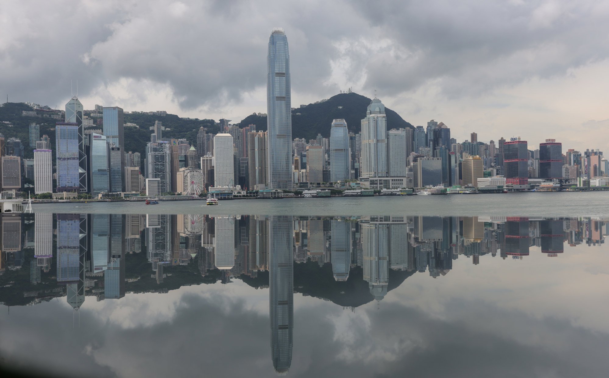 Hong Kong Island is reflected in the waters of Victoria Harbour on August 29. As a vibrant global hub, Hong Kong can be a testing ground for solutions to the world’s most pressing problems. Photo: Jelly Tse