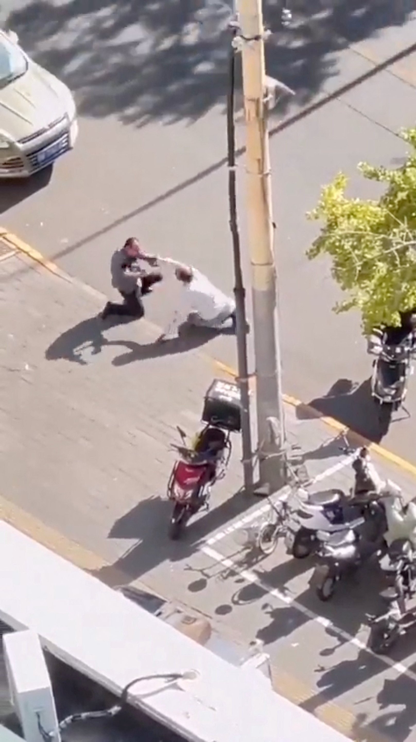 Screen grab from a social media video shows the scene of the stabbing in Beijing on Friday. Photo: via Reuters