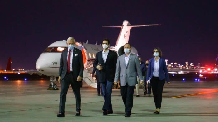Michael Kovrig and Michael Spavor disembark from a plane in Canada after being released
