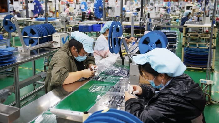 Workers at a Foxconn factory in China