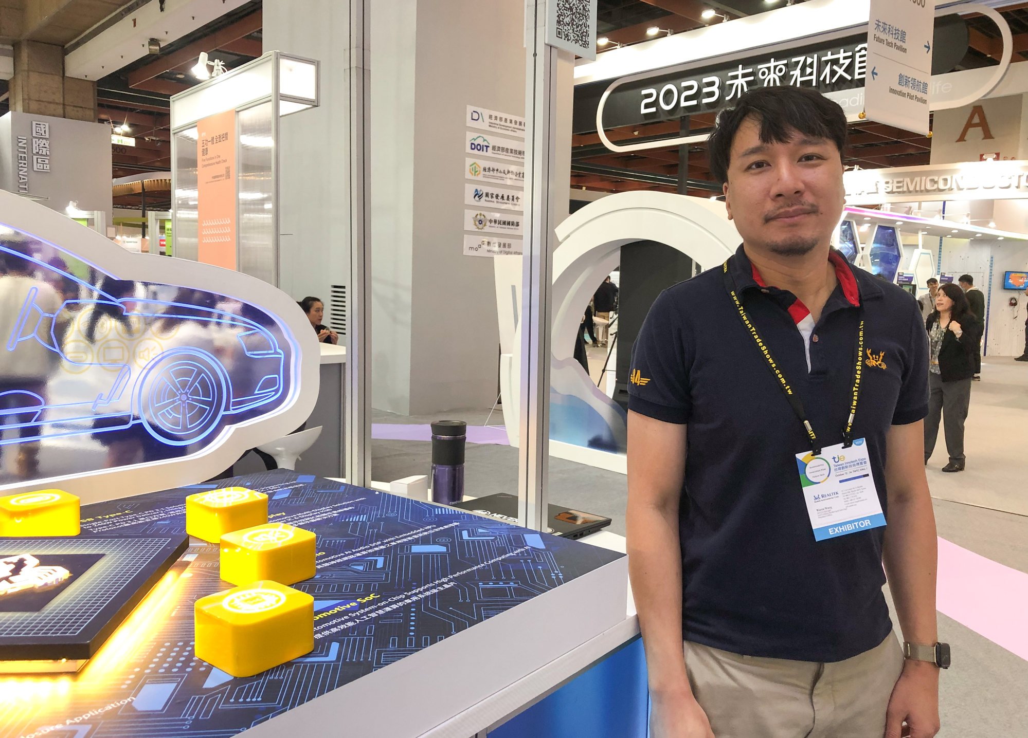Realtek Semiconductor international marketing account manager Wayne Wang displays new technology at the Taiwan Innotech Expo on October 12, 2023. Photo: Ralph Jennings