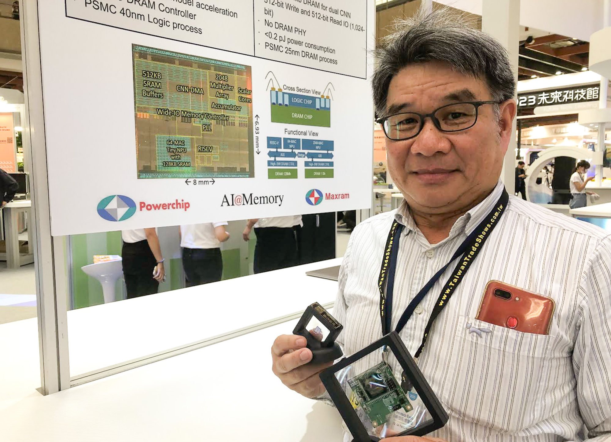 Cheng Lin-her, general manager of ATBS Technology, shows a power-saving memory integrated circuit at the Taiwan Innotech Expo on October 12, 2023. Photo: Ralph Jennings