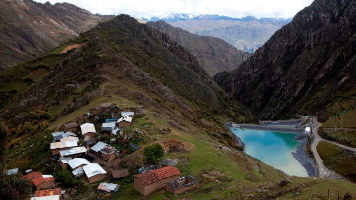 Homes along a runoff pond from the Antamina mine