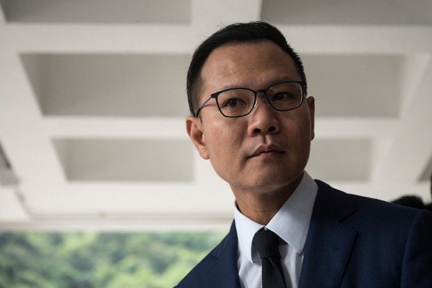 ENG_CHN_HKNatSec_10112023.2.jpg Pro-democracy lawmaker Dennis Kwok answers the questions from the media outside Hong Kong's High Court, Oct. 31, 2019. Credit: Philip Fong/AFP