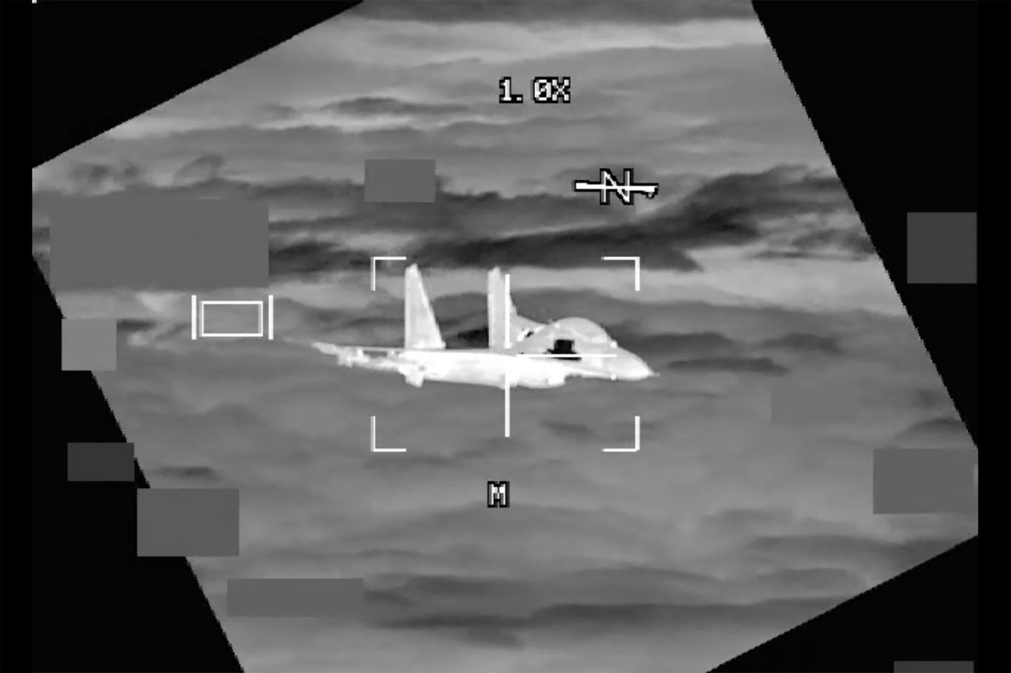 A Chinese fighter is seen from a US Air Force B-52 aircraft over the South China Sea on October 24. The Chinese aircraft came within 10 feet of the American plane, the US military said. Photo: US Indo-Pacific Command via AP
