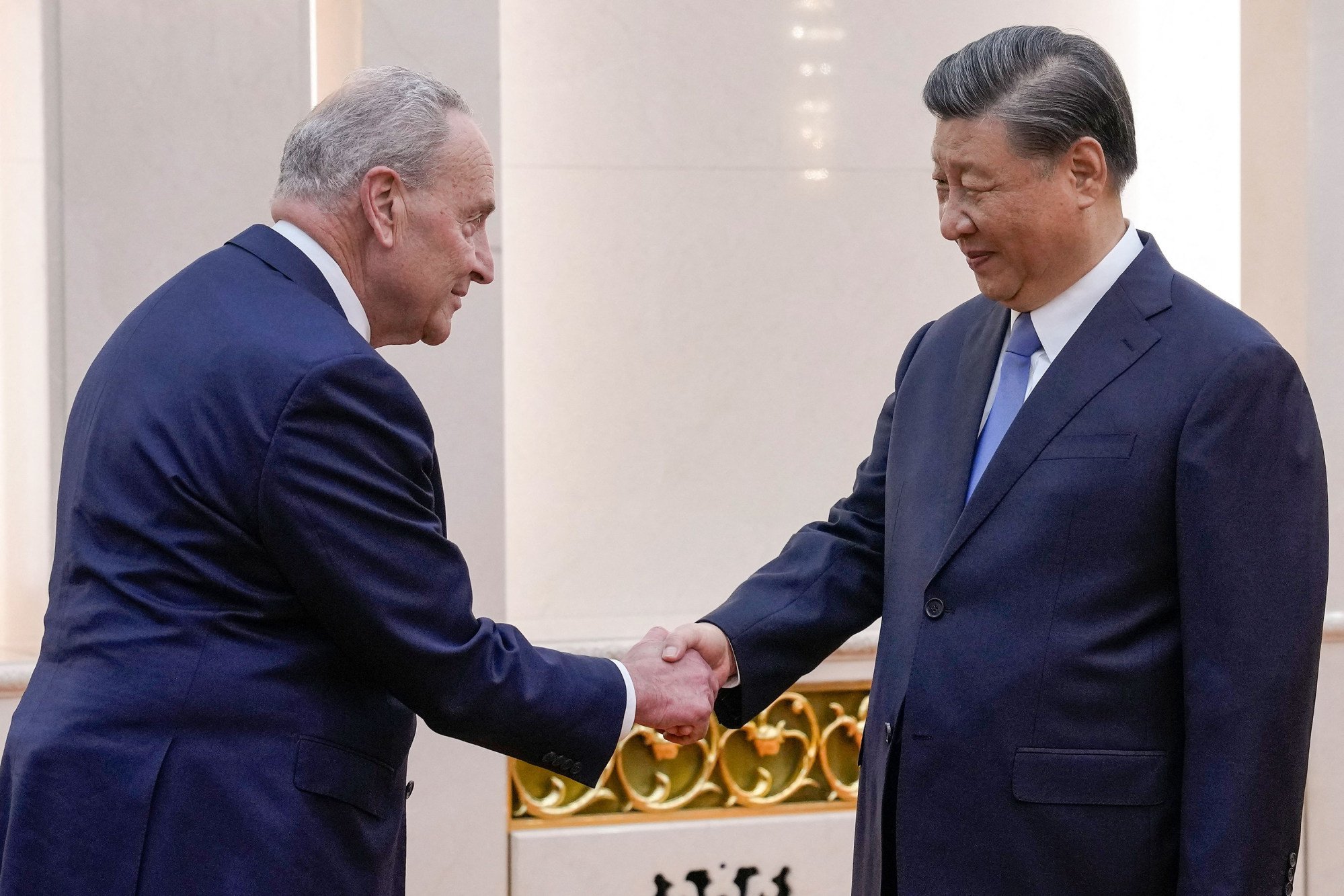 US Senate Majority Leader Chuck Schumer is greeted by Chinese President Xi Jinping in Beijing on October 9. Photo: AFP/Getty Images/TNS