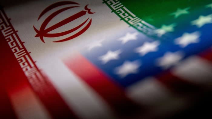 A montage of the Iranian and US flags