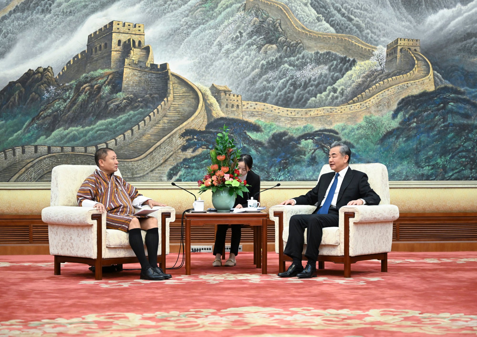 Bhutan’s top diplomat Tandi Dorji in talks with his Chinese counterpart Wang Yi on Monday. Photo: Xinhua