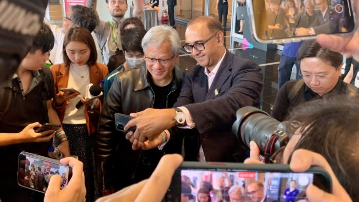 Nvidia chief Jensen Huang having a selfie during a technology show
