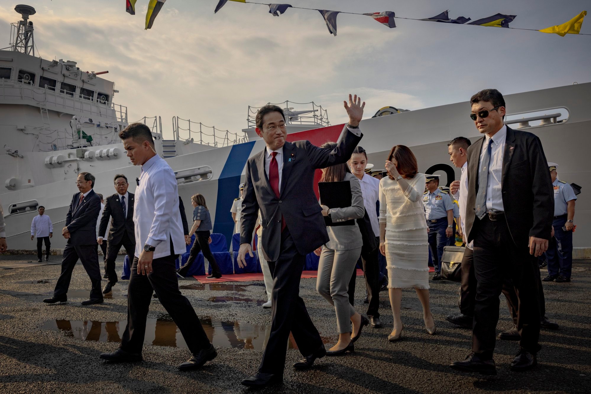 Japanese Prime Minister Fumio Kishida (centre) visits the Japanese-made patrol ship BRP Teresa Magbanua at the coastguard’s headquarters in Manila on Saturday. Photo: EPA-EFE
