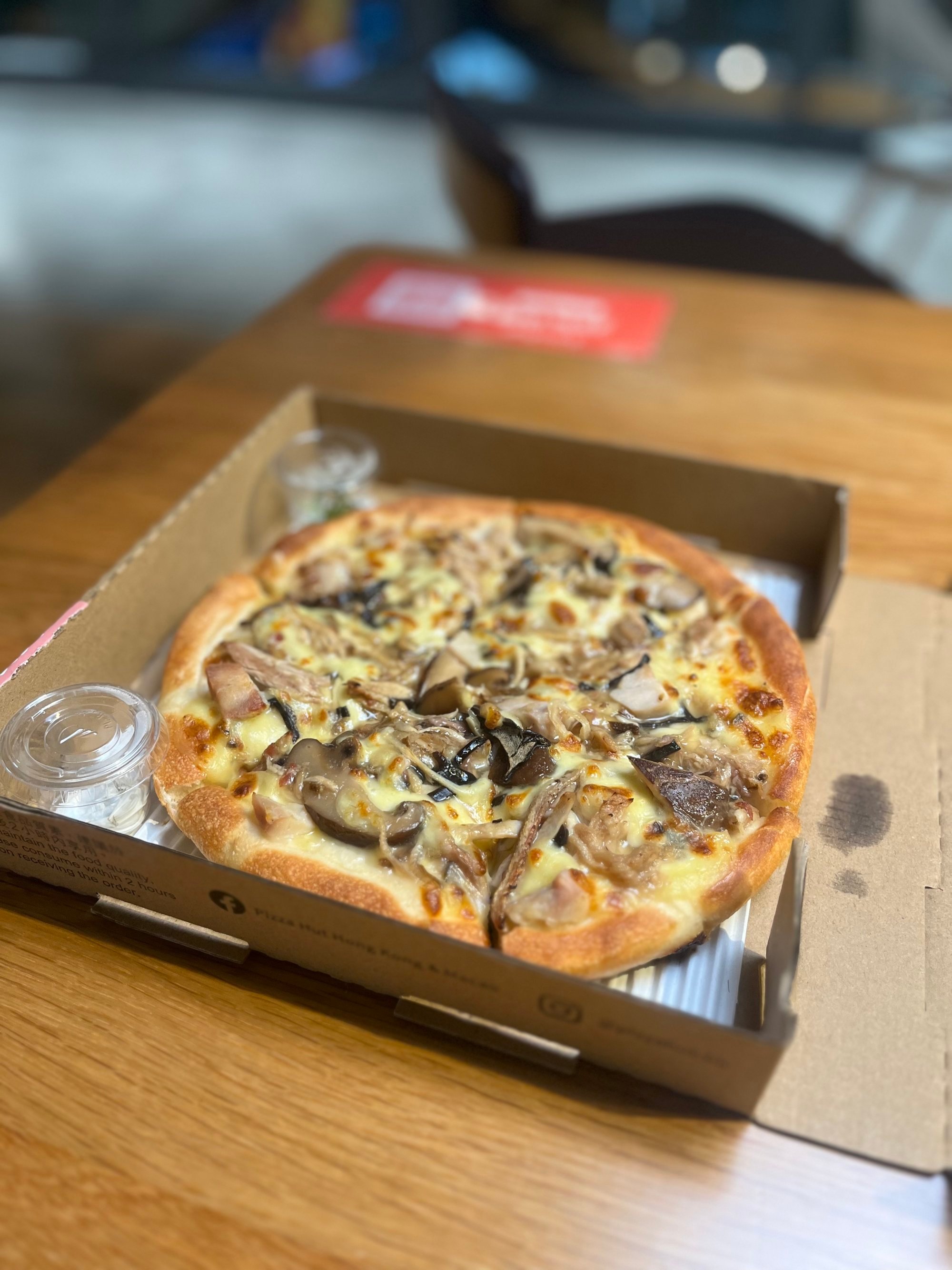 Pizza Hut’s snake soup pizza, created in collaboration with heritage restaurant Ser Wong Fun, features the flavours and ingredients of snake soup on a pie. Photo: Charmaine Mok