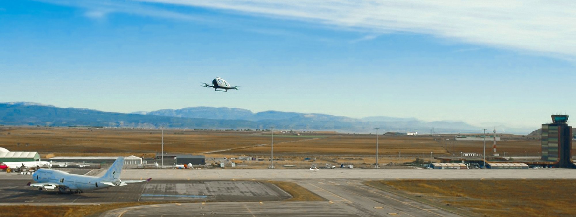 EHang’s EH216-S electric vertical take-off and landing vehicle hovers above the company’s first European Urban Air Mobility centre, inside the Lleida – Alguaire International Airport in Spain, on November 1, 2023. Photo: Handout