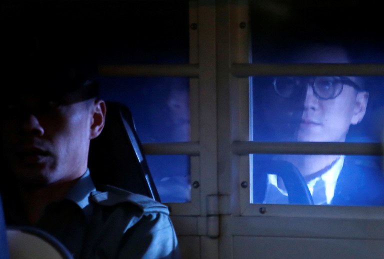ENG_CHN_INTERVIEWBlackBauhinia_11172023_03.jpg Hong Kong pro-independence protester Edward Leung is taken away in a prison van after he pleaded guilty in court to assaulting a police officer, in Hong Kong in 2018. the film focuses exclusively on Hong Kong localism and the independence movement, following activist Edward Leung. Credit: Bobby Yip/Reuters