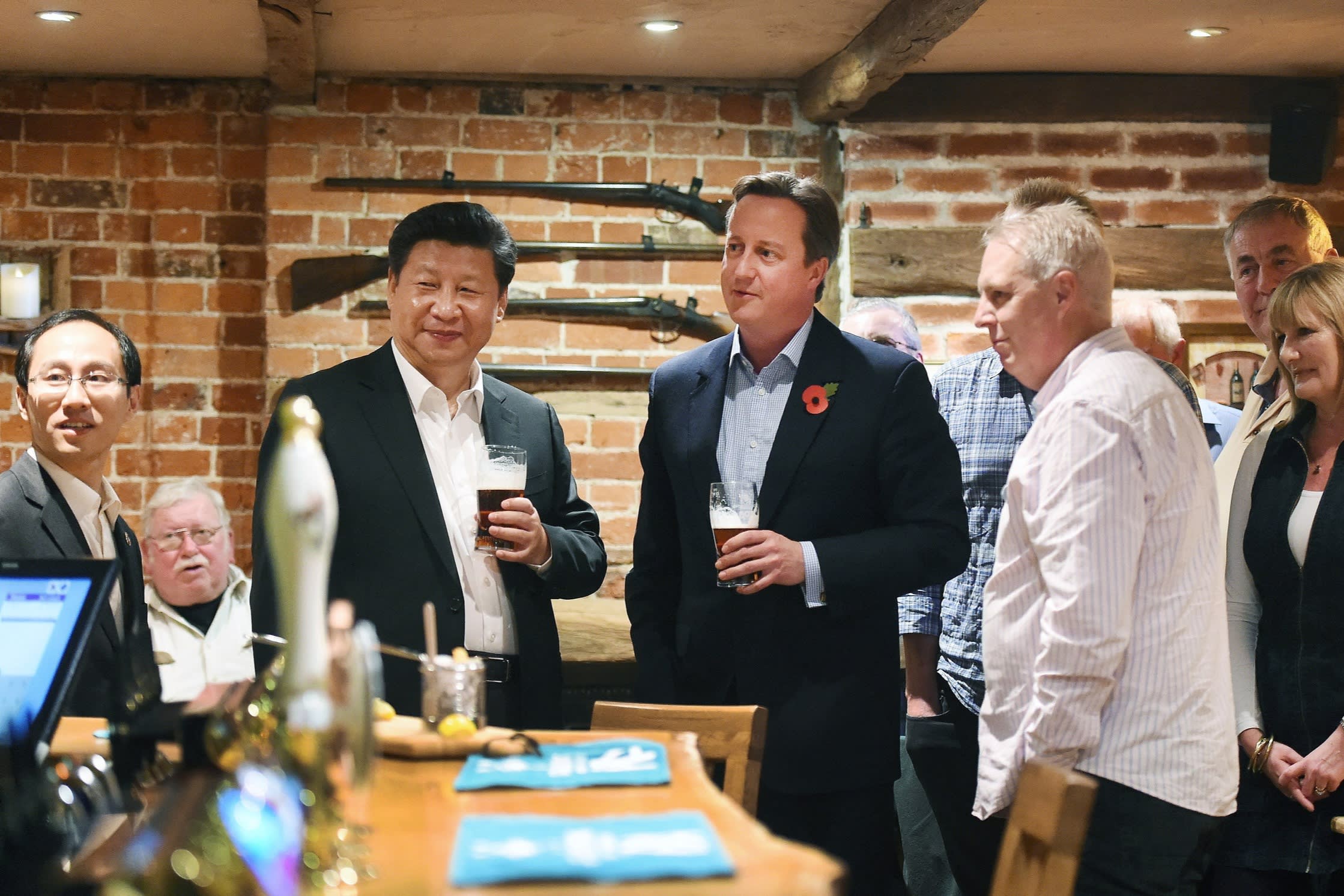 David Cameron, fourth from left, and Xi Jinping, to his right