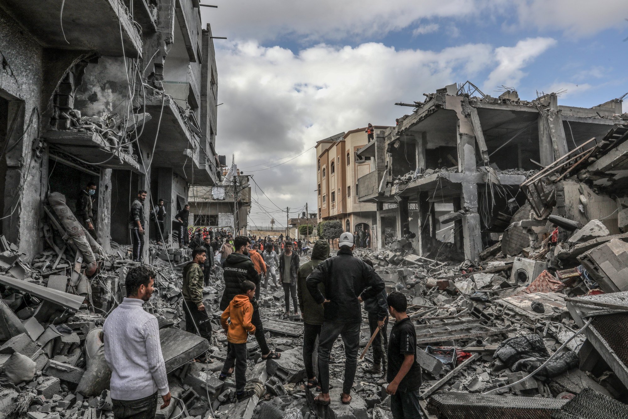 Palestinians inspect the rubble of a building belonging to the Rabie family, following Israeli bombardment amid the ongoing battles between Israel and the Palestinian militant group Hamas. Photo: dpa