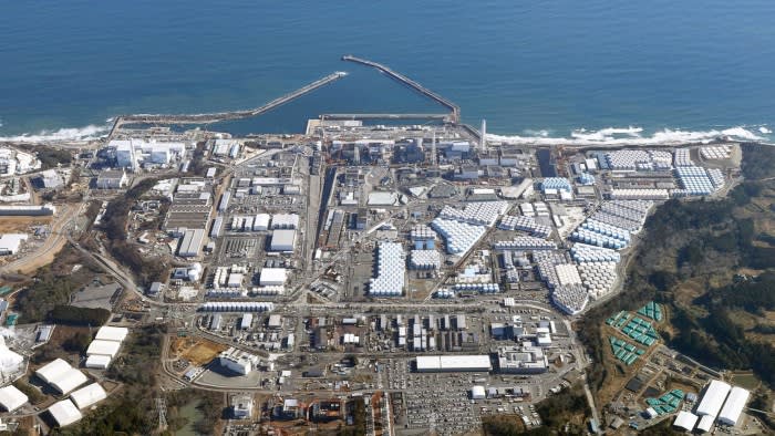 The plant surrounded by water tanks