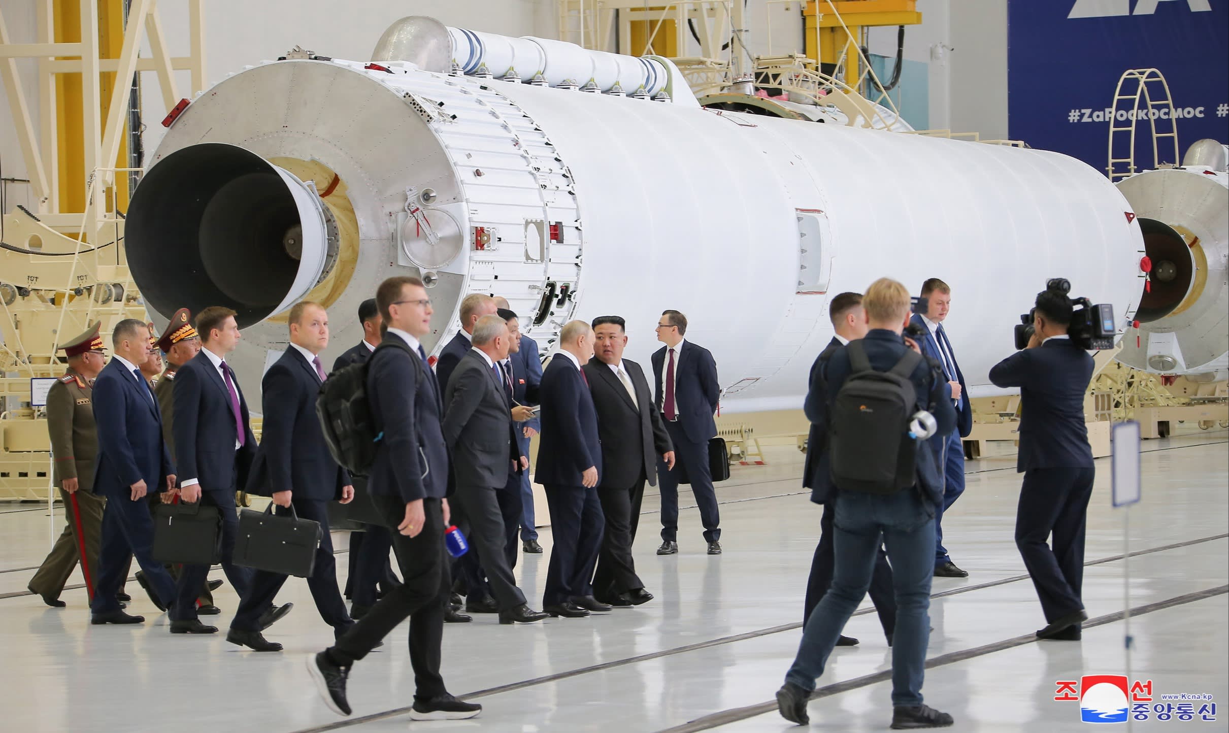 Vladimir Putin talks to Kim Jong Un at a meeting in Siberia in September.