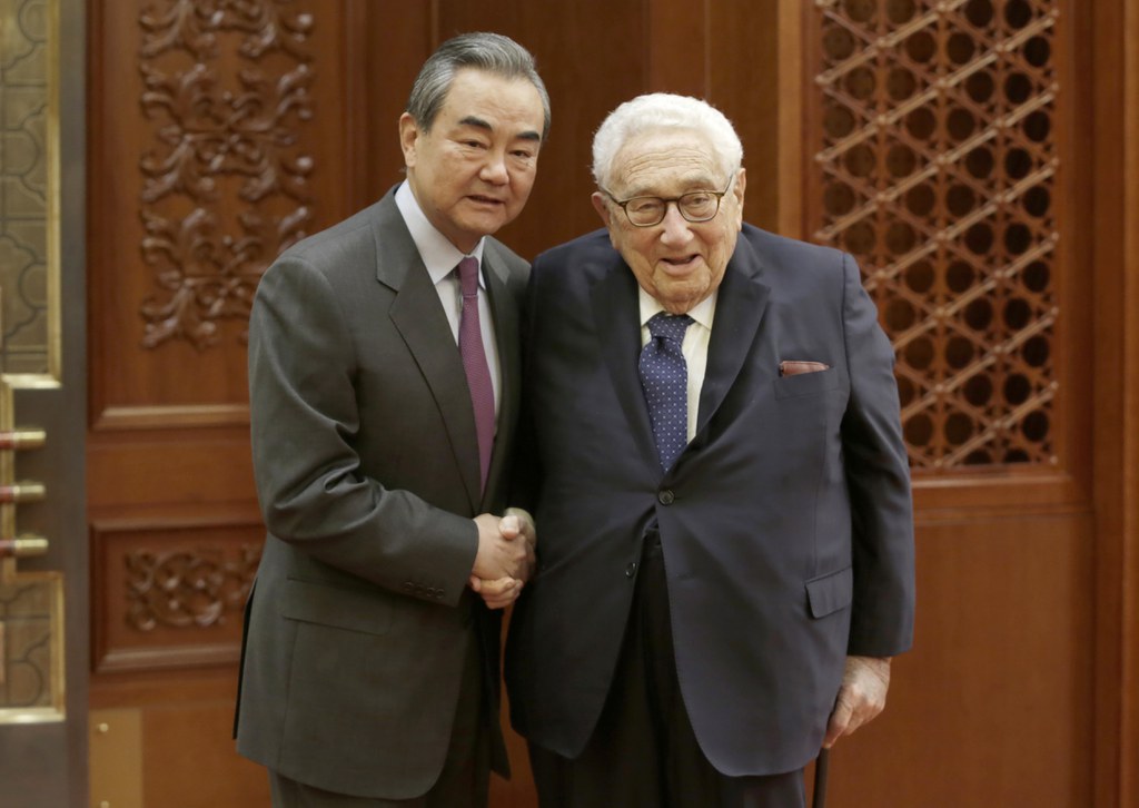 China’s Foreign Minister Wang Yi meets former Secretary of State Henry Kissinger at the Great Hall of the People in Beijing, Nov. 22, 2019. (Jason Lee/Pool via AP)