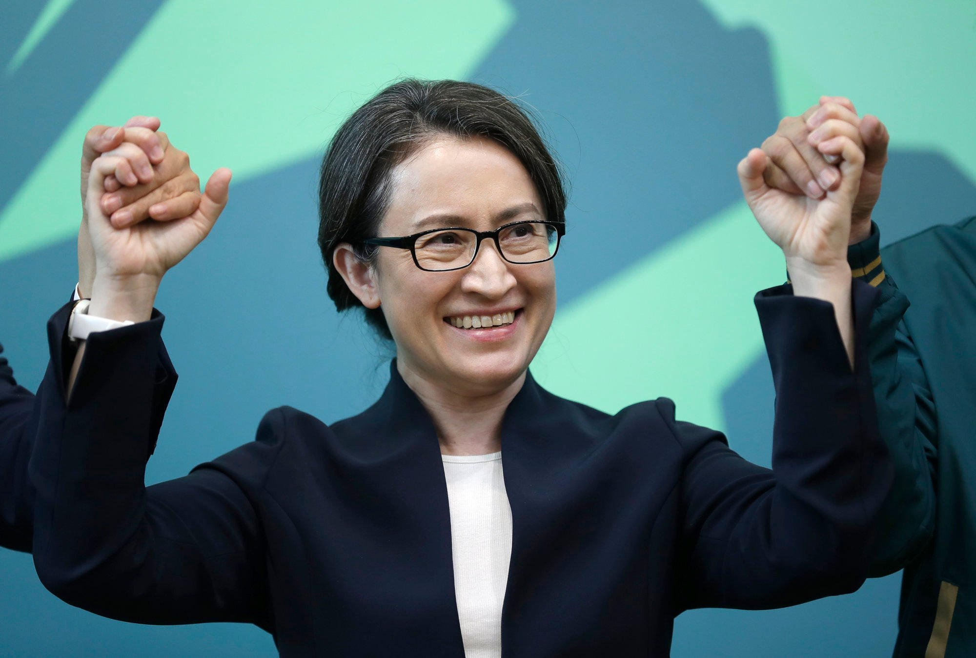 Hsiao Bi-khim, Taiwan’s former de-facto envoy to the US, raises her hands as she is announced as the vice- presidential candidate to run with William Lai Ching-te of the ruling Democratic Progressive Party in Taipei on Monday. Photo: AP