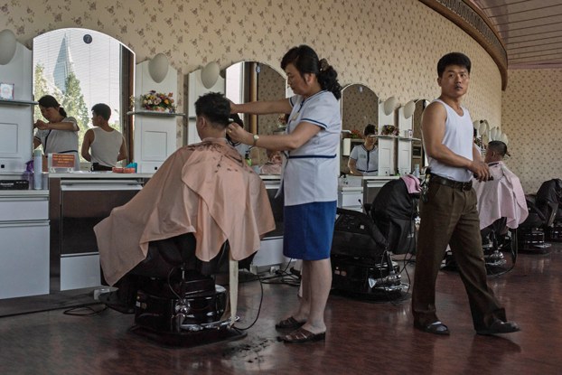 2_ENG_KOR_HairLossTreatment_11182023_05.jpg A public salon in Pyongyang, North Korea, in 2017. Credit: Ed Jones/AFP