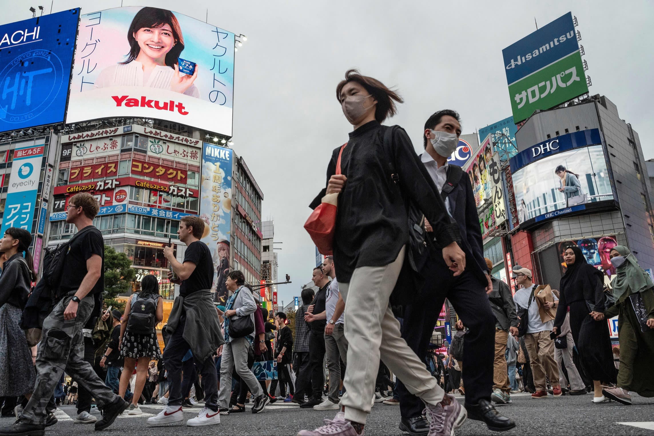 Pedestrians at Shibuya Crossing in central Tokyo