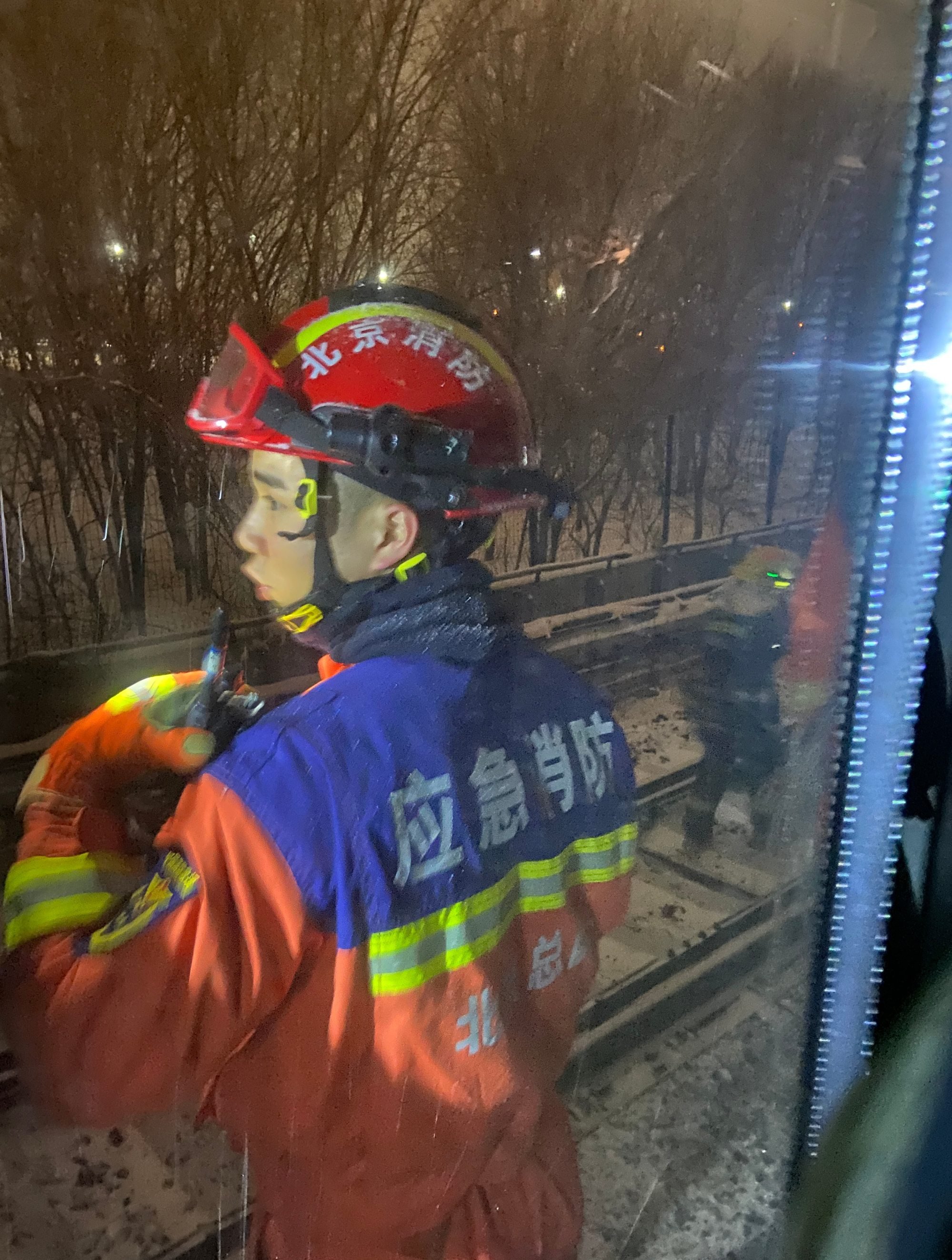 Evacuation and rescue teams assess the situation after a commuter train lost carriages after a sudden stop in China’s capital Beijing on Thursday evening. Photo: Weibo