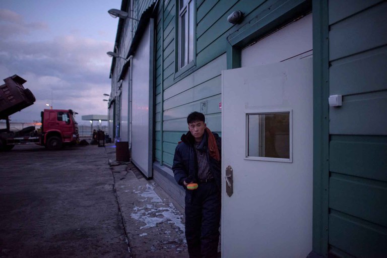 nkorean-russia-border.jpg A North Korean worker leaves a warehouse at the joint Russia-North Korea RasonConTrans coal port at Rajin harbor in the northeastern city of Rason, near the borders of both China and Russia, Nov. 20, 2017. Credit: Ed Jones/AFP