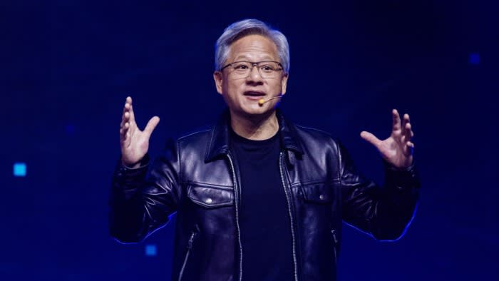 Jensen Huang, co-founder and chief executive officer of Nvidia, speaks during a Hon Hai Precision Industry event in Taipei, Taiwan, in October