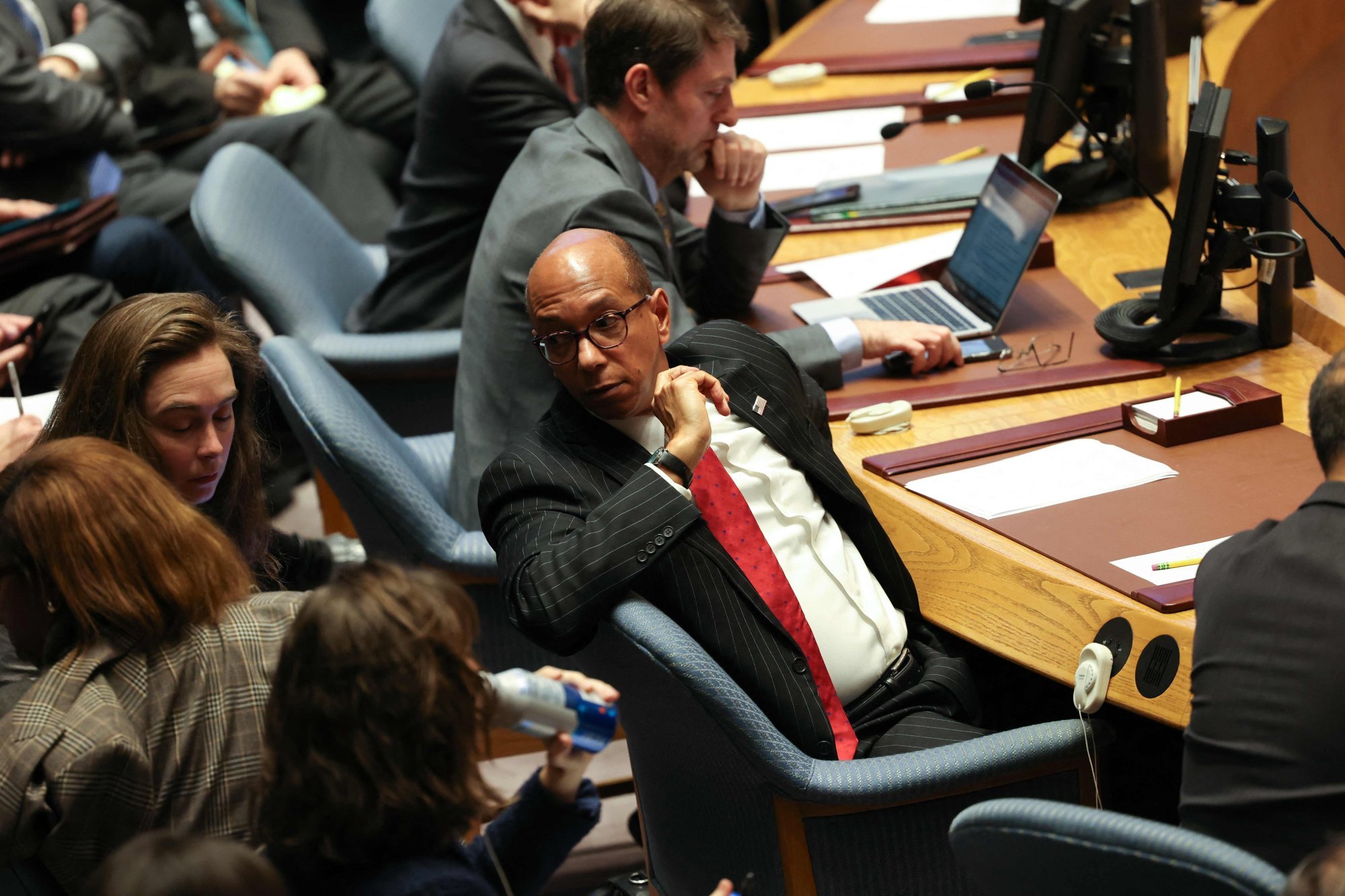 Robert Wood, US deputy ambassador to the UN, confers with advisers during a UN Security Council meeting in New York on Tuesday. Photo: AFP