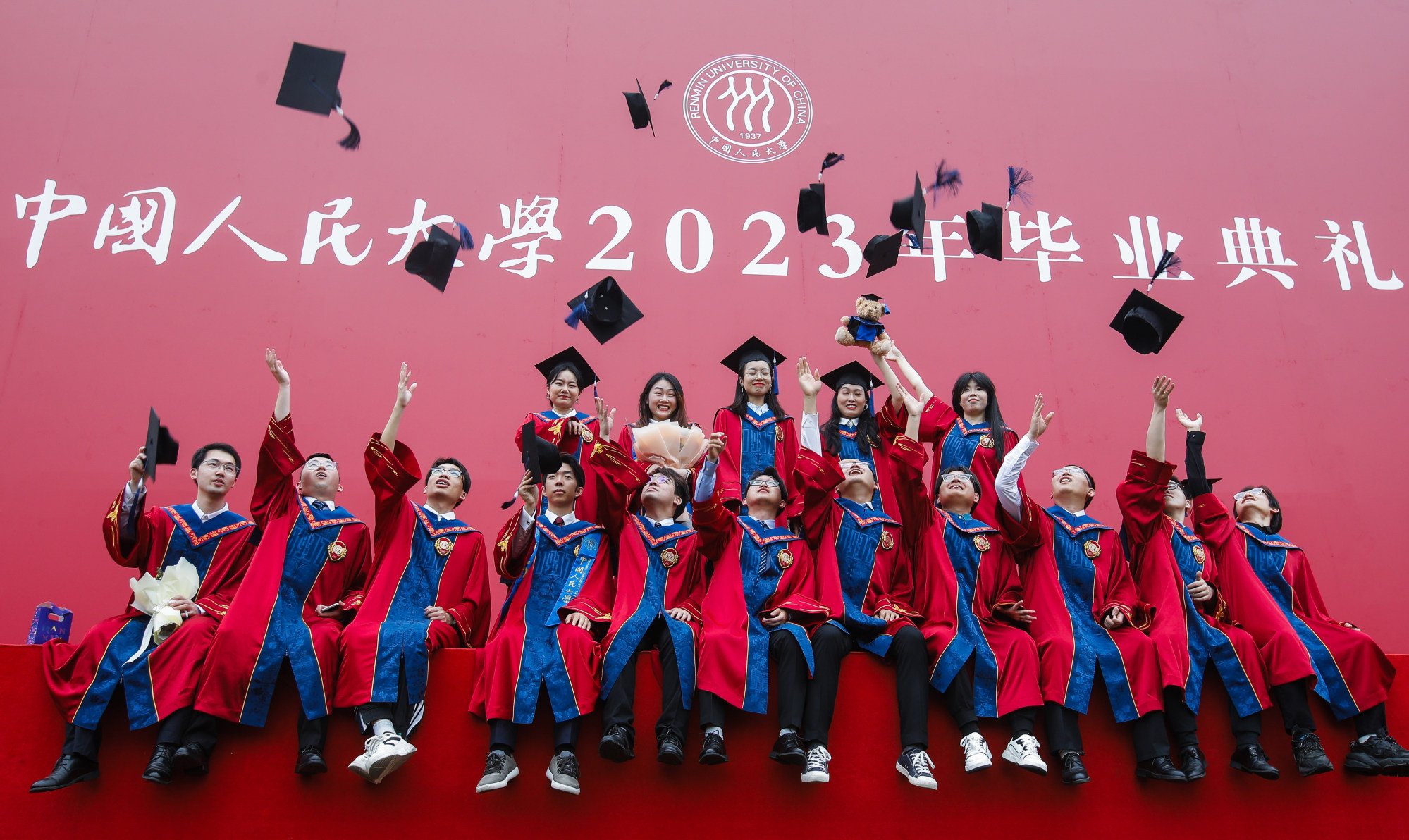 Graduates from Renmin University in Beijing in 2023. Chinese students are now more likely to consider less expensive countries for furthering their studies abroad as households experience tougher times. Photo: EPA-EFE