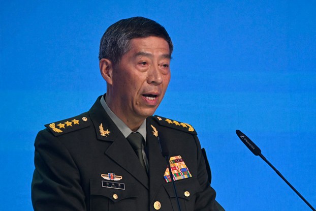 China’s Defense Minister Li Shangfu, shown at a conference in August 2023, was removed from office in October. (Alexander Nemenov/AFP)