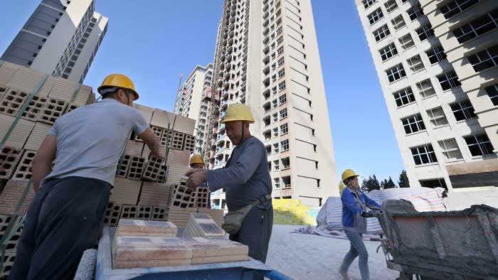 Construction workers at a housing project in Hefei, Anhui province