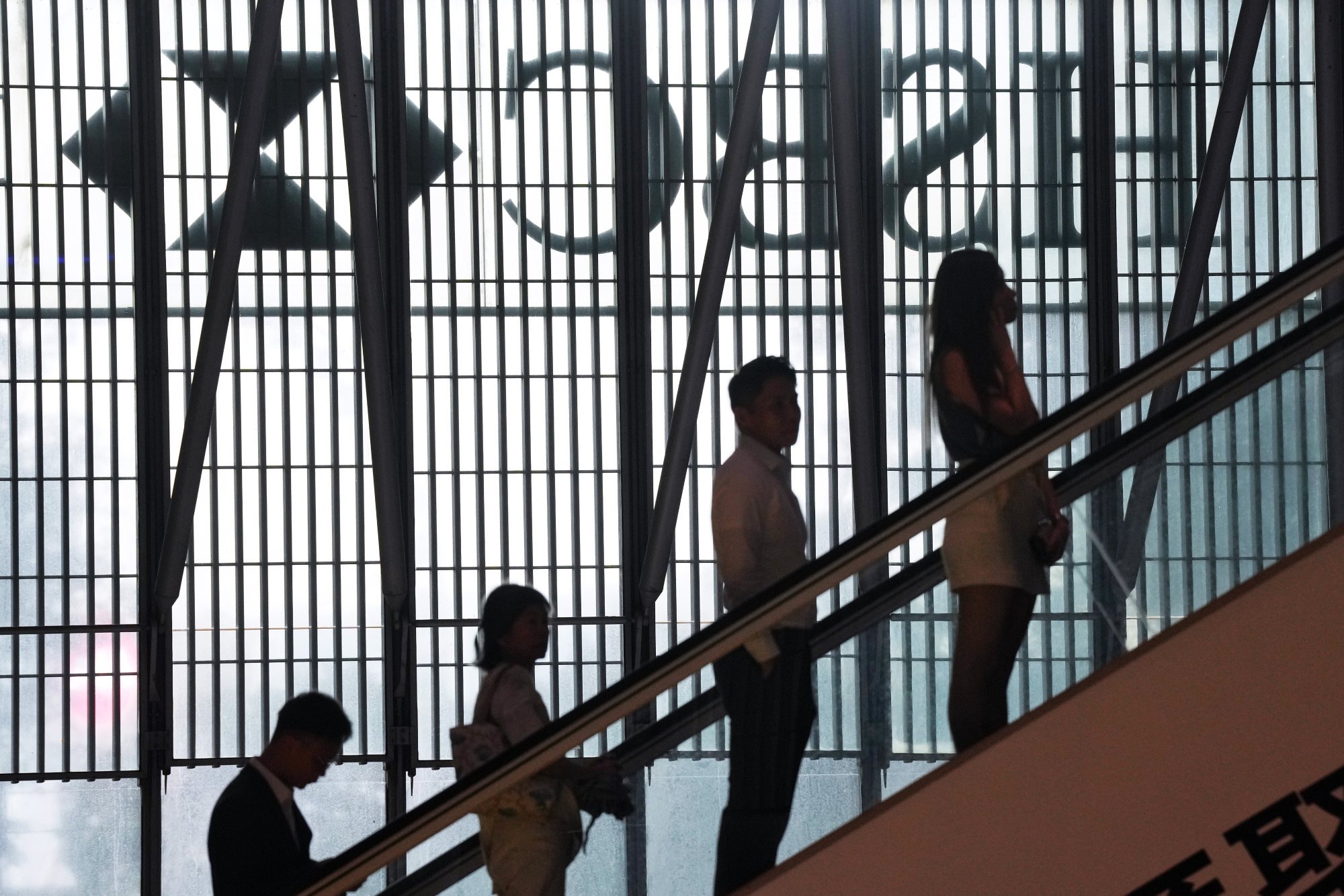 Customers ride an escalator inside HSBC’s headquarters in Central, Hong Kong on October 30, 2022. Photo: Elson Li