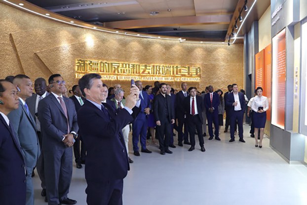 ENG_UYG_TravelJunkets_01112024.2.jpg Foreign envoys visit an exhibition on Xinjiang's anti-terrorism and de-radicalization work in Urumqi, capital of northwestern China's Xinjiang region, Aug. 4, 2023. (Zhao Chenjie/Xinhua via Getty Images)