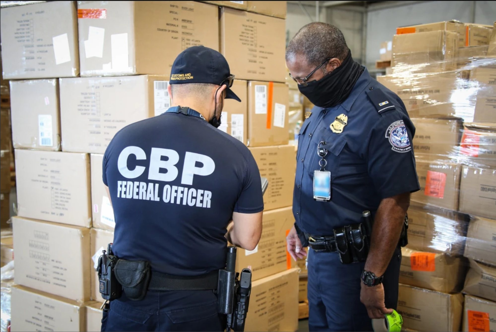 US Customs and Border Protection officers in Atlanta inspect apparel suspected to have been made with cotton harvested by forced labour in China’s Xinjiang region. Photo: US Customs and Border Protection
