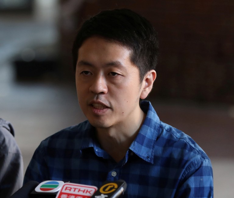ENG_CHN_HKNatSec_01252024.3.JPG Then-District Councilor Ted Hui delivers a statement to the media at Hong Kong Polytechnic University in Hong Kong, Nov. 27, 2019. (Leah Millis/Reuters)